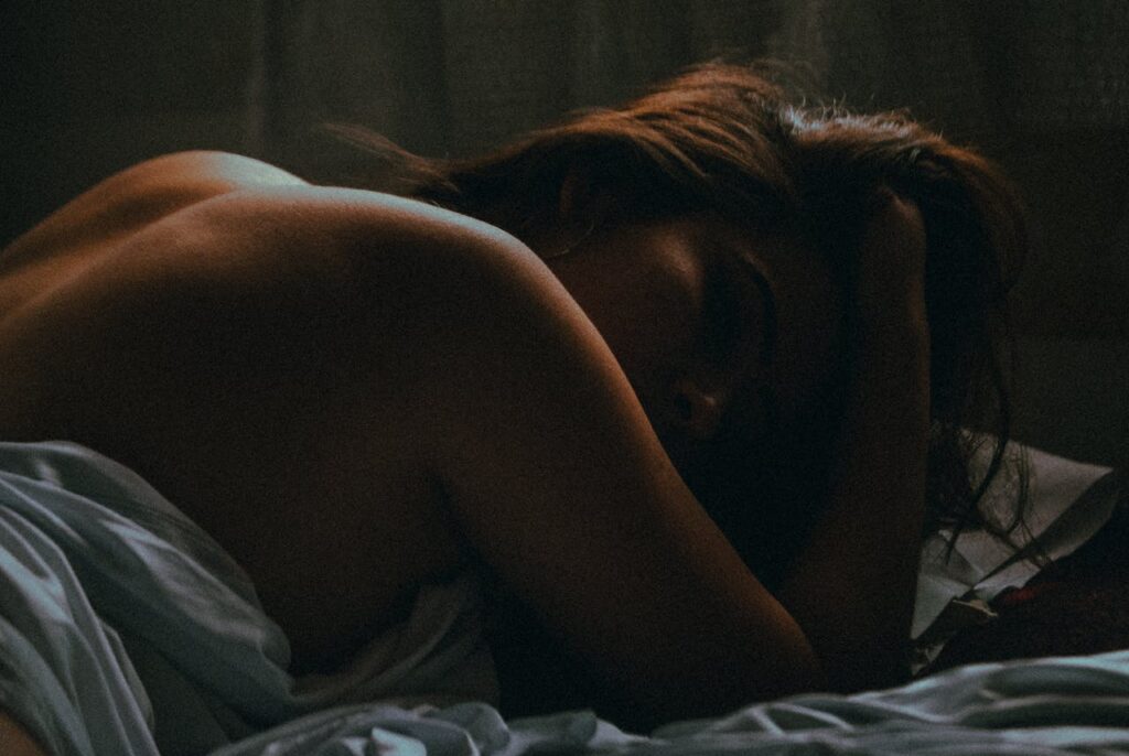 Salomé A contemplative mood captures a resting woman's serene and introspective moment.